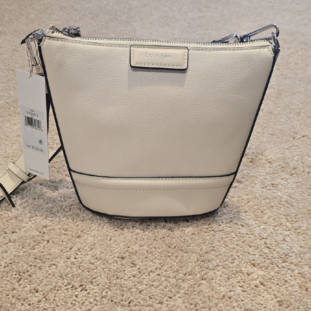Calvin Klein Cream Leather Crossbody Bucket Bag with Silver Hardware